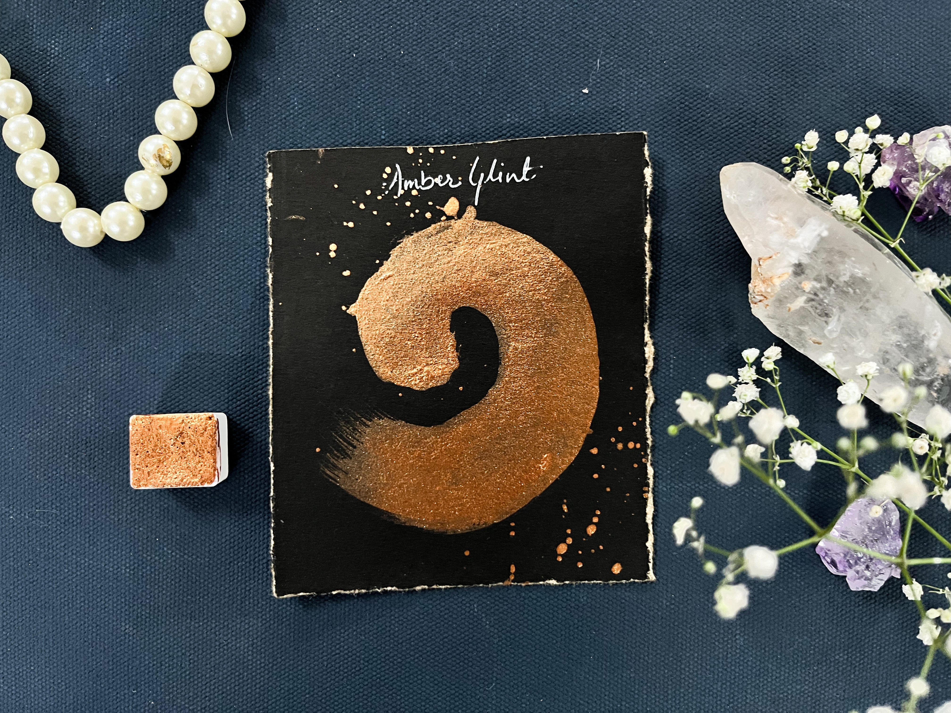 AMBER GLINT