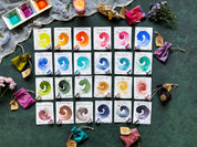 PRE ORDER - ADVENT CALENDAR - 24 Paint Pans in Silk Bags & Watercolor Sketchbook | LIMITED EDITION