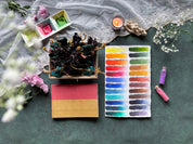 [PRE ORDER] ADVENT CALENDAR - 24 Paint Pans in Silk Bags & Watercolor Sketchbook | LIMITED EDITION